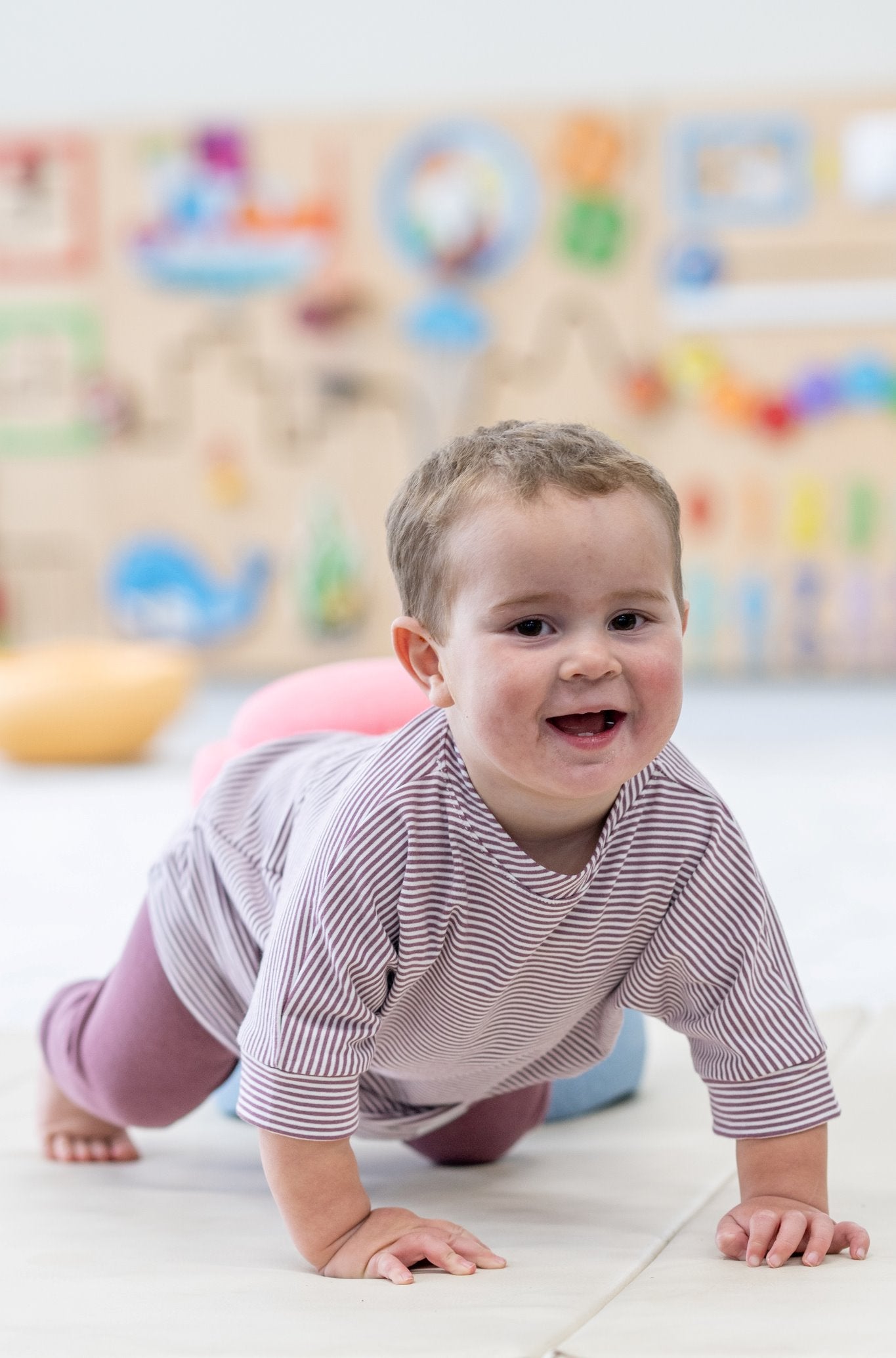 Rose Brown Stripes grow-with-me t-shirt for kids, made from soft organic cotton with a stretchy, foldable waistband. Ethically made in Canada for a sustainable and comfy fit.