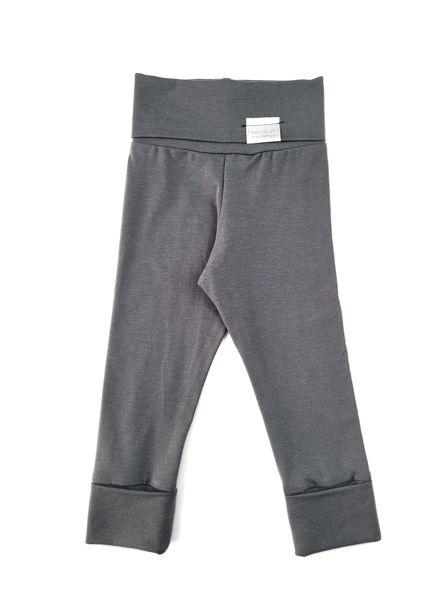 Dark grey grow-with-me leggings for toddlers, made from soft, eco-friendly fabric. Adjustable waistband and cuffs for a long-lasting fit. Ethically made in Canada.