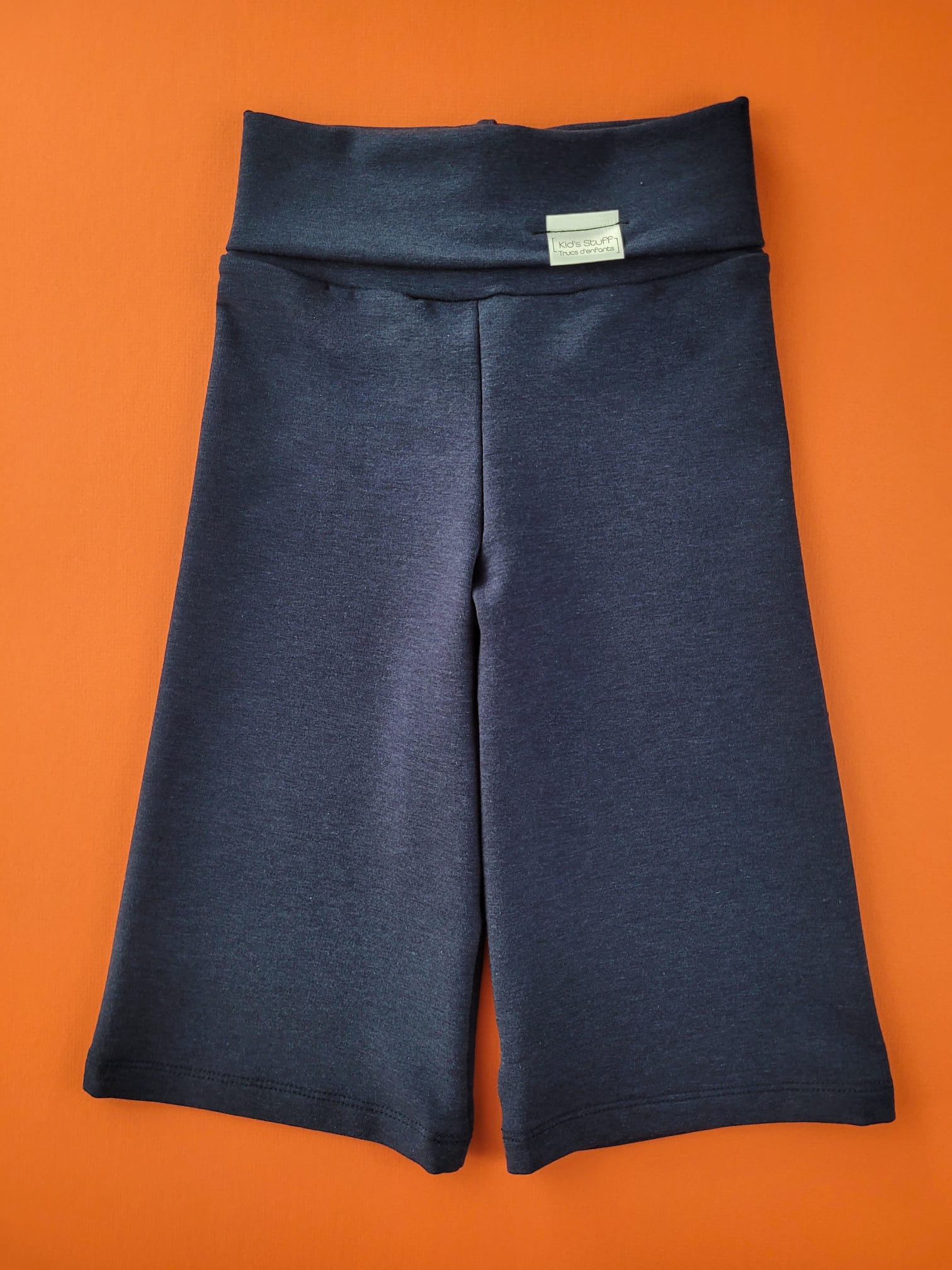 Eco-friendly kids' clothing – gender-neutral navy wide leg pants grow-with-me pants, sustainably made in Canada.