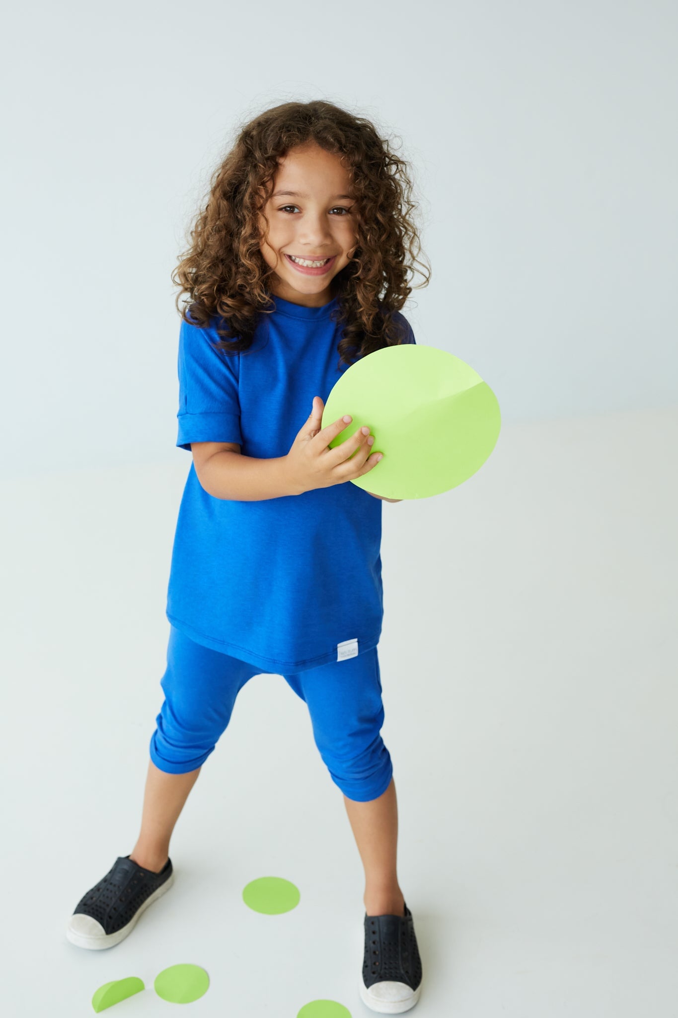 Sonic Blue grow-with-me shorts for kids, made from soft organic cotton with a stretchy, foldable waistband. Ethically made in Canada for a sustainable and comfy fit.