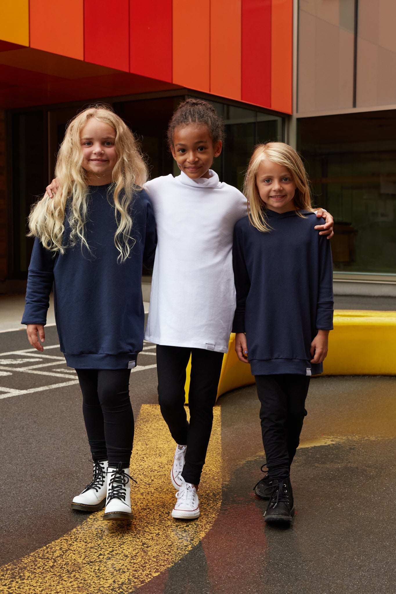 Eco-friendly kids' clothing – gender-neutral Navy grow with me sweater, sustainably made in Canada.