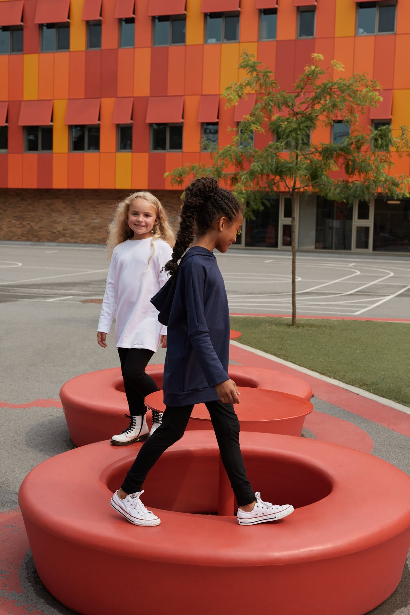 Eco-friendly kids' clothing – gender-neutral navy grow with me hoodie, sustainably made in Canada.