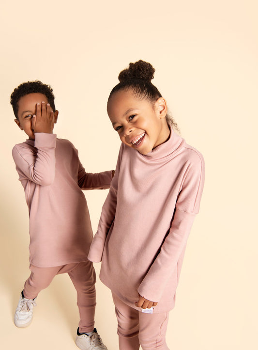 Eco-friendly kids' clothing – gender-neutral Strawberry Milkshake Pink grow with me turtleneck, sustainably made in Canada.