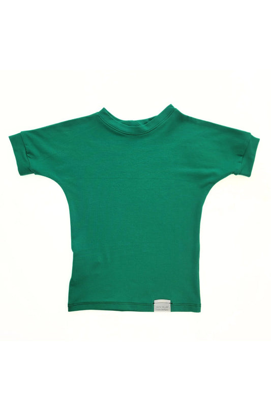 Green grow-with-me t-shirt for kids, made from soft organic cotton with a stretchy, foldable waistband. Ethically made in Canada for a sustainable and comfy fit.