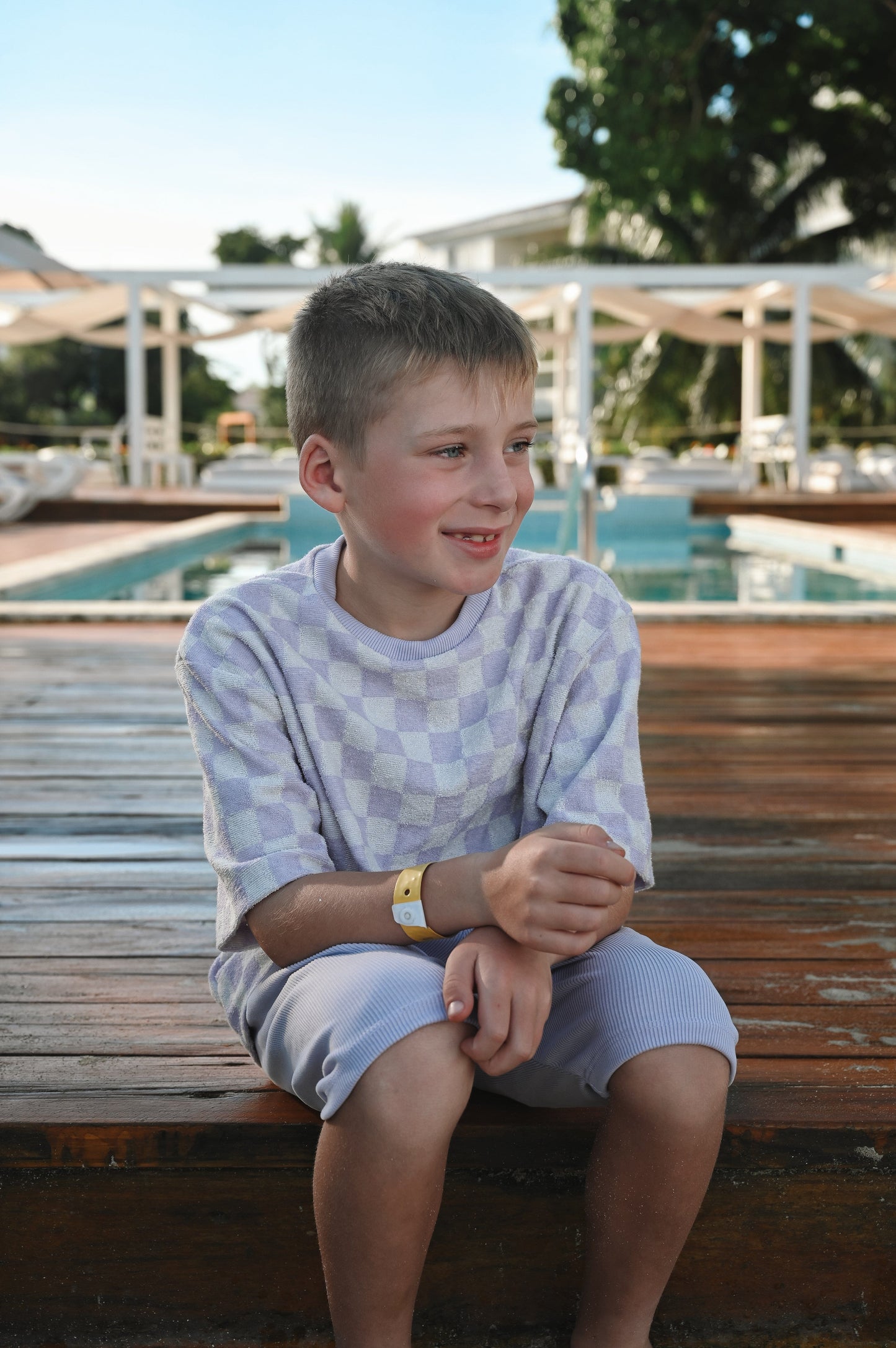 Checkered lilac oversize kids t-shirt made in Canada with eco-friendly fabric designed to grow with your child