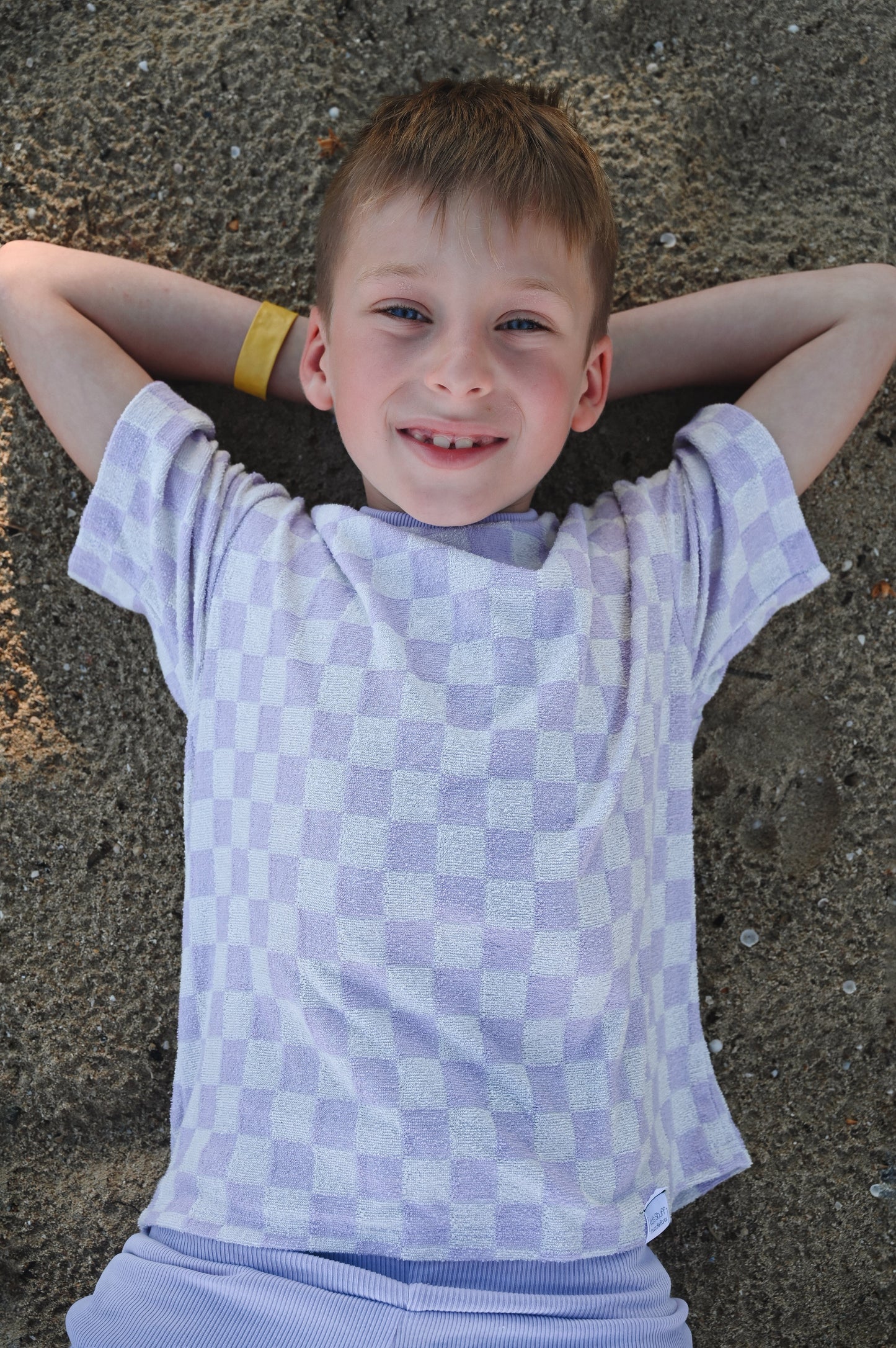 Checkered lilac oversize kids t-shirt made in Canada with eco-friendly fabric designed to grow with your child