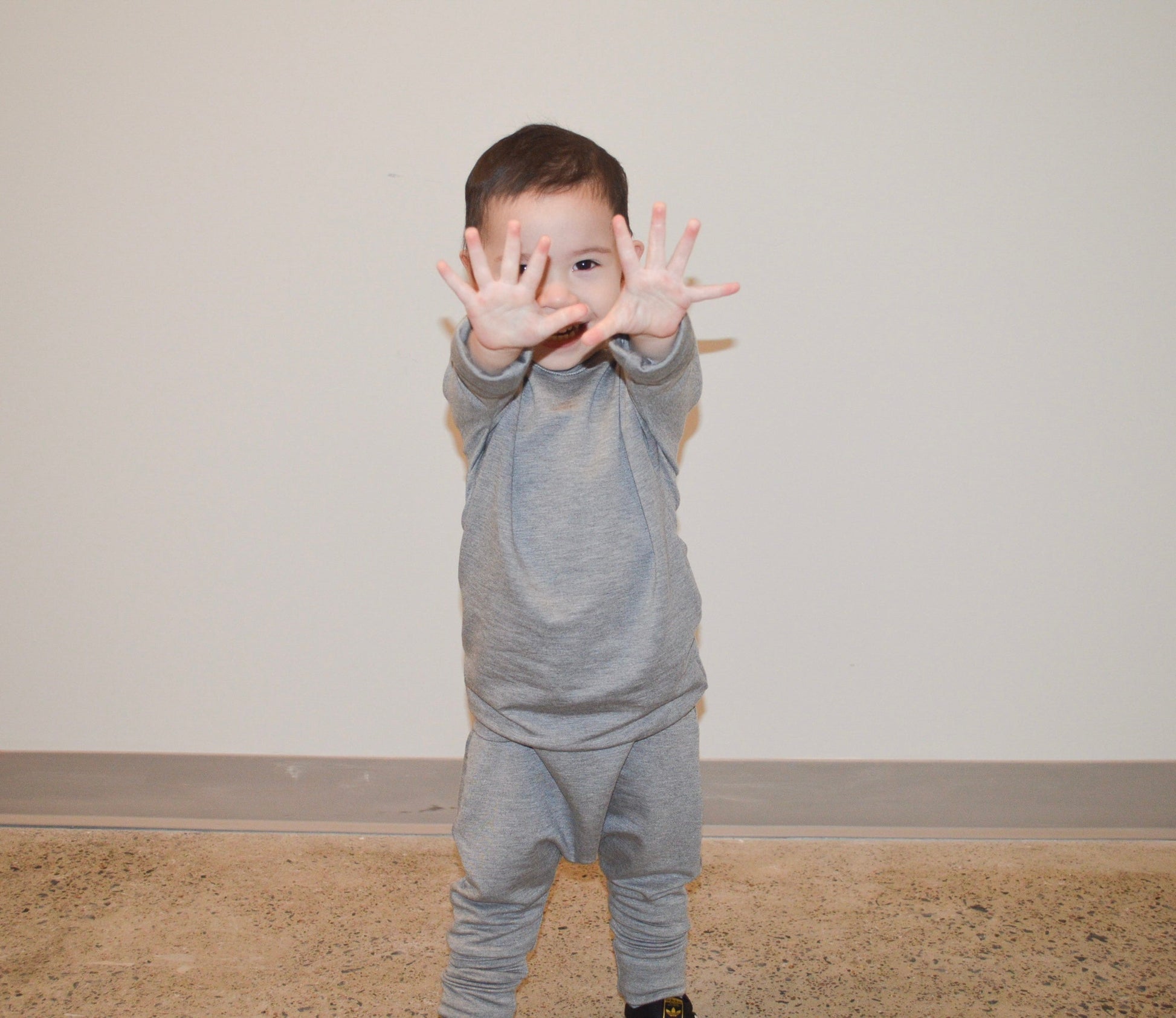 Eco-friendly kids' clothing – gender-neutral Grey Cloud grow with me sweater, sustainably made in Canada.