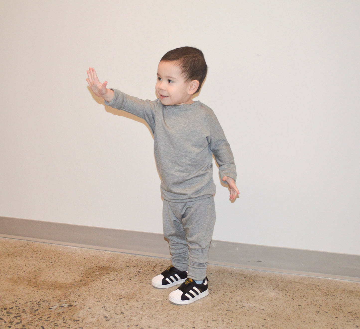 Eco-friendly kids' clothing – gender-neutral Grey Cloud grow with me sweater, sustainably made in Canada.