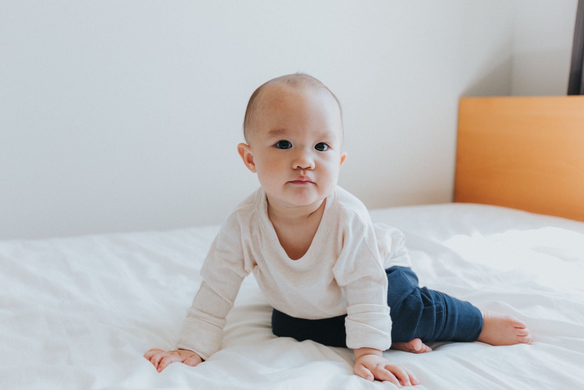 Heather Cream grow-with-me shirt for toddlers and kids, designed to be worn as a dress, tunic, or long shirt. Seamless shoulders and soft, eco-friendly fabric. Ethically made in Canada.