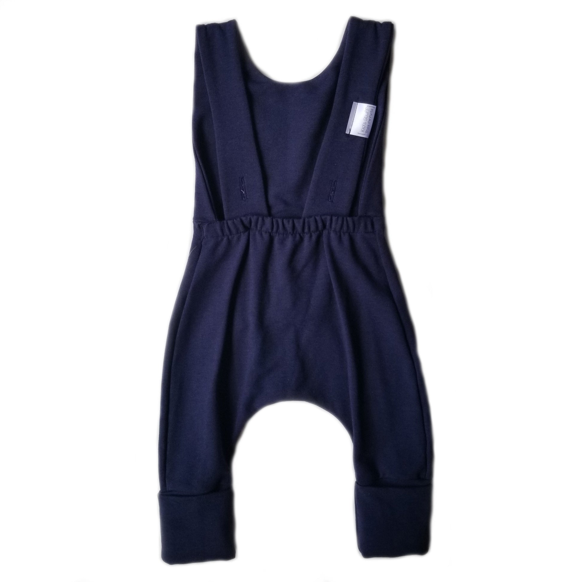 navy grow-with-me overalls for toddlers and kids, made from soft, eco-friendly fabric. Adjustable straps and cuffs for a long-lasting fit. Ethically made in Canada.
