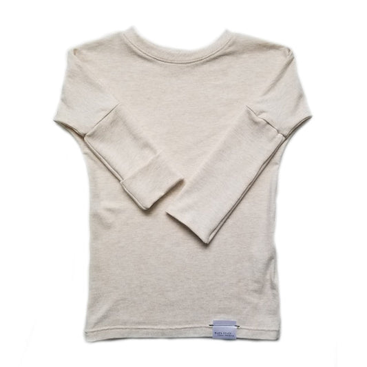 Heather Cream grow-with-me shirt for toddlers and kids, designed to be worn as a dress, tunic, or long shirt. Seamless shoulders and soft, eco-friendly fabric. Ethically made in Canada.