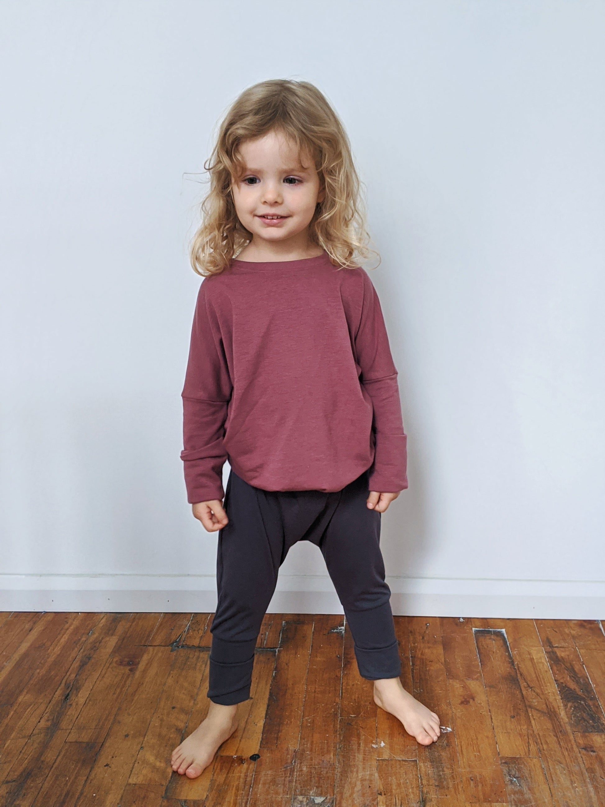 Rose brown grow-with-me shirt for toddlers and kids, designed to be worn as a dress, tunic, or long shirt. Seamless shoulders and soft, eco-friendly fabric. Ethically made in Canada.