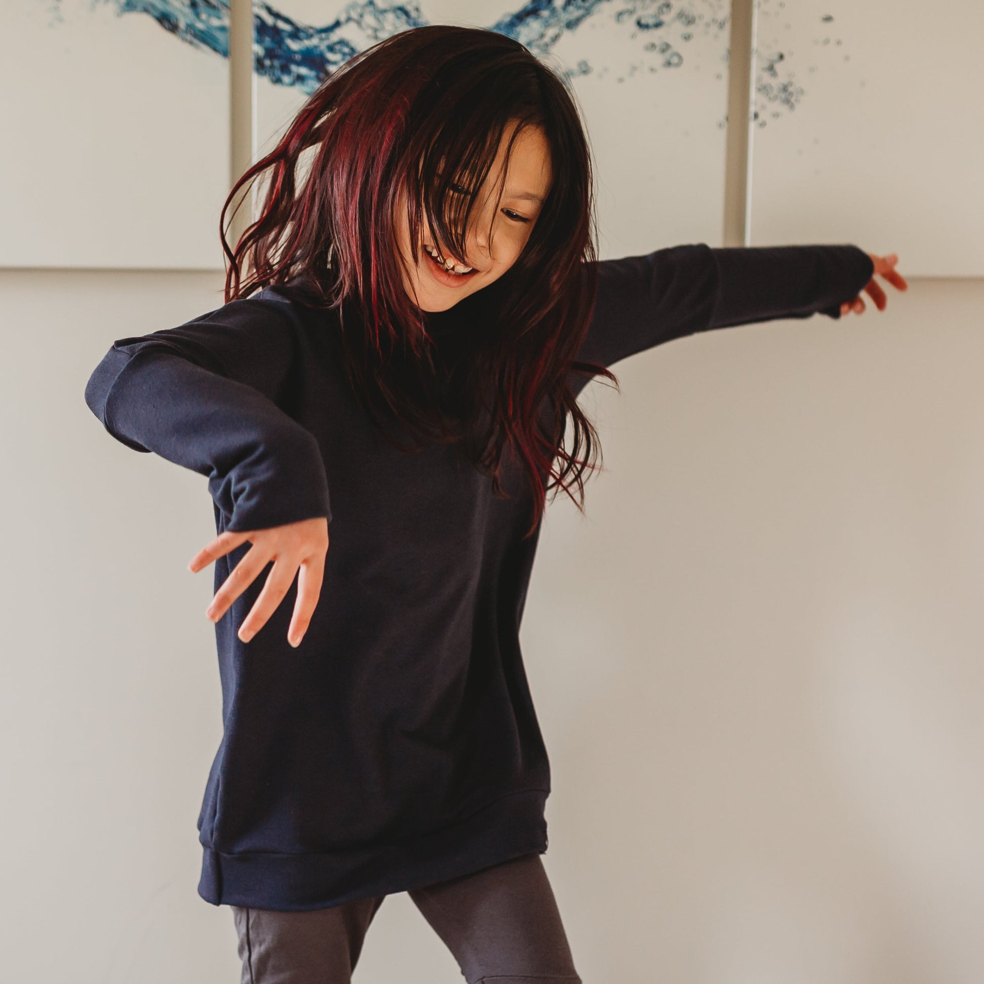 Eco-friendly kids' clothing – gender-neutral navy grow with me hoodie, sustainably made in Canada.