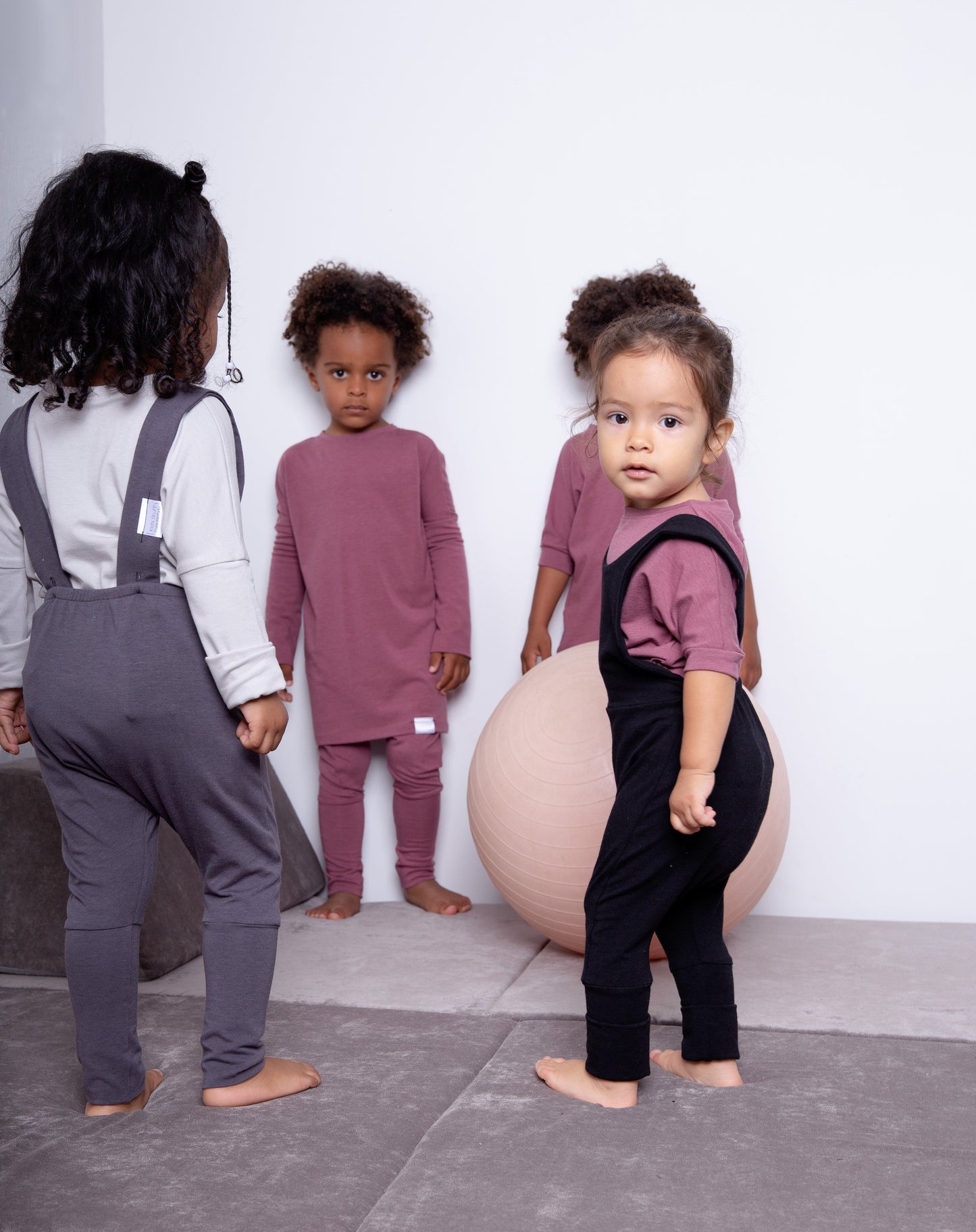 Rose brown grow-with-me shirt for toddlers and kids, designed to be worn as a dress, tunic, or long shirt. Seamless shoulders and soft, eco-friendly fabric. Ethically made in Canada.