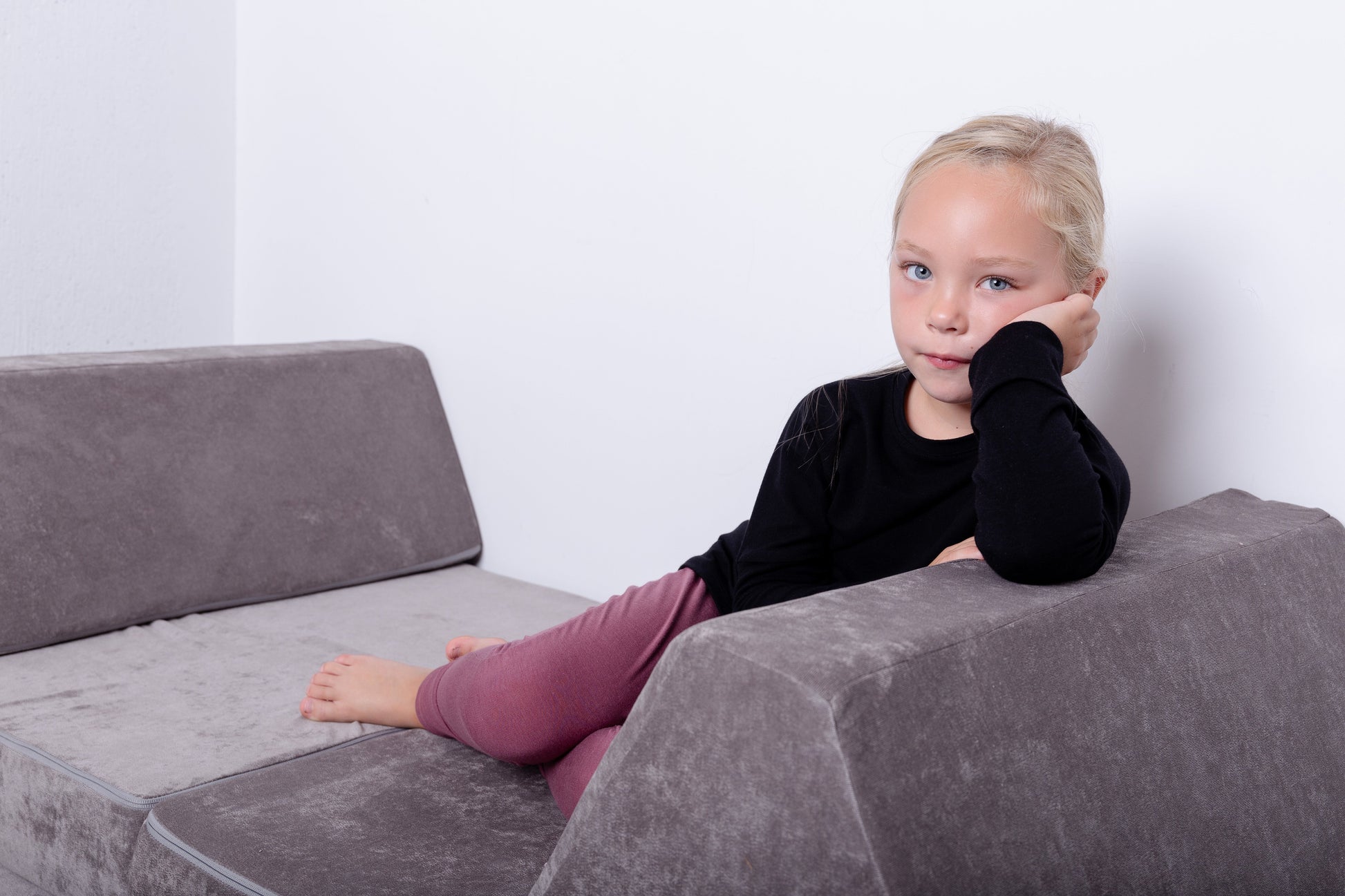 Rose brown grow-with-me pants for toddlers and kids, made from soft, eco-friendly fabric. Adjustable waistband and cuffs for extended wear. Ethically made in Canada.