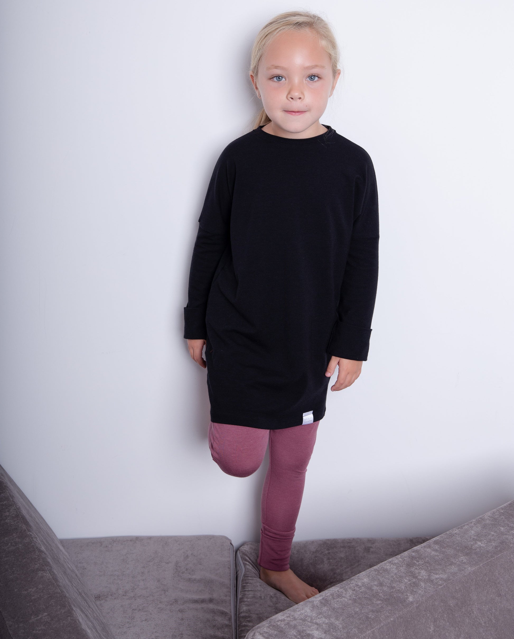 Rose brown grow-with-me pants for toddlers and kids, made from soft, eco-friendly fabric. Adjustable waistband and cuffs for extended wear. Ethically made in Canada.