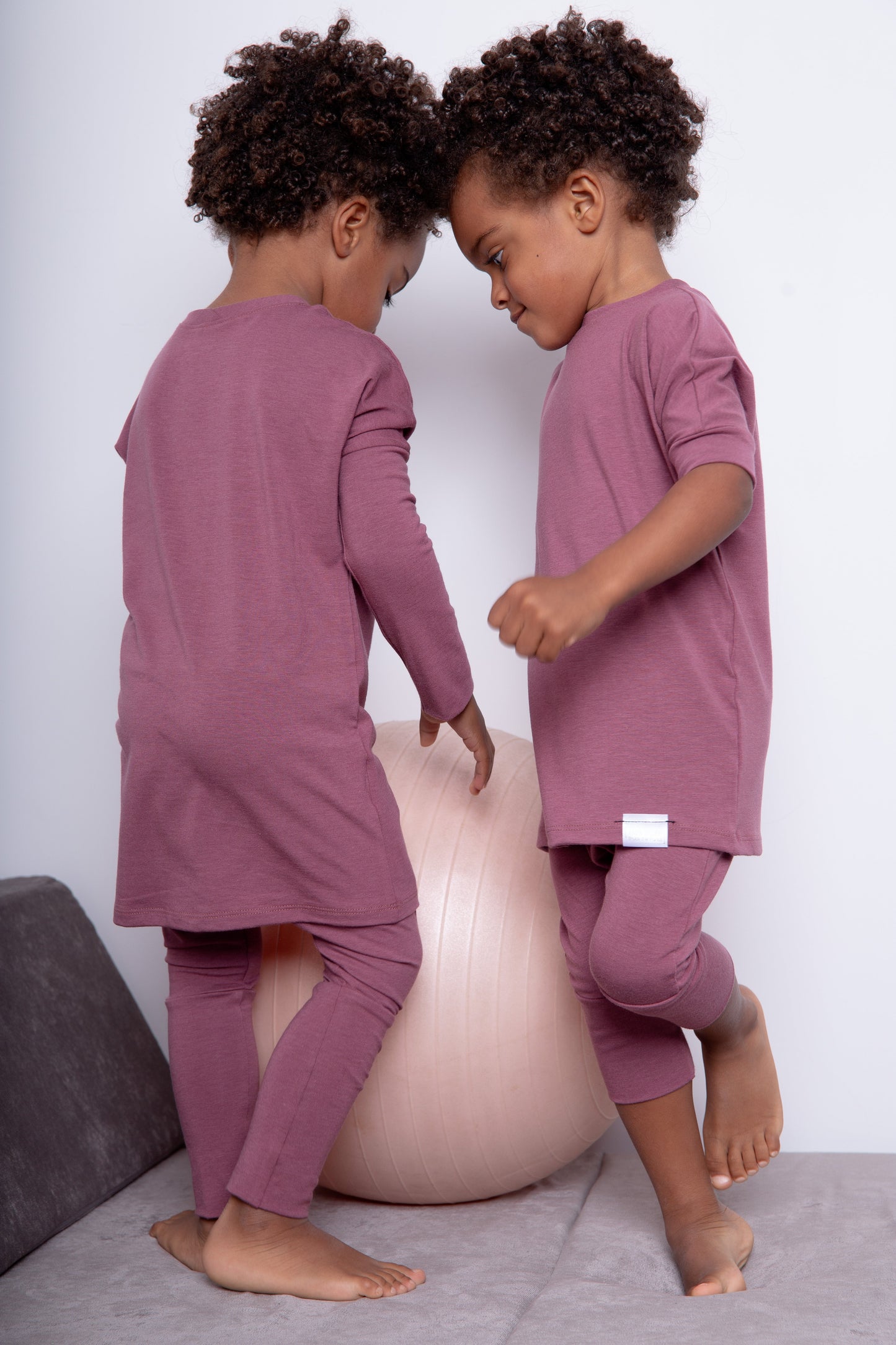 Rose brown grow-with-me shirt for toddlers and kids, designed to be worn as a dress, tunic, or long shirt. Seamless shoulders and soft, eco-friendly fabric. Ethically made in Canada.