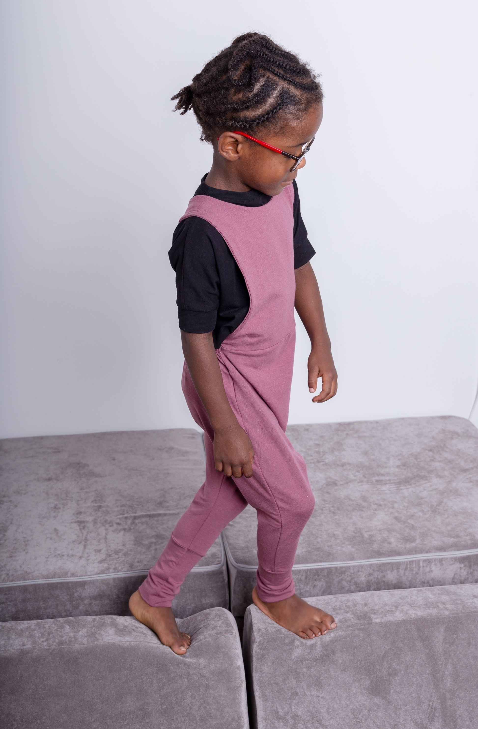 Rose brown grow-with-me overalls for toddlers and kids, made from soft, eco-friendly fabric. Adjustable straps and cuffs for a long-lasting fit. Ethically made in Canada.