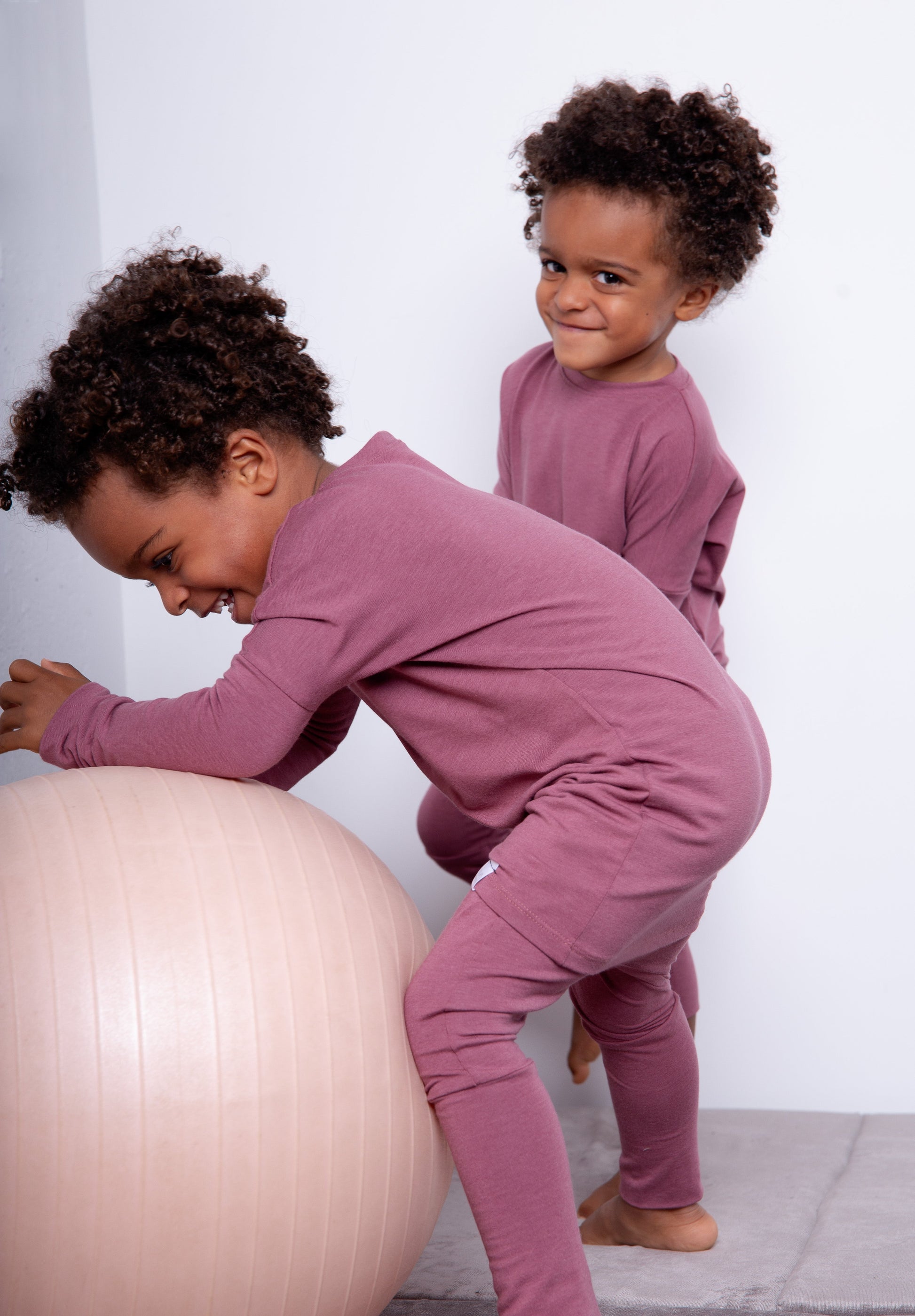 Rose brown grow-with-me pants for toddlers and kids, made from soft, eco-friendly fabric. Adjustable waistband and cuffs for extended wear. Ethically made in Canada.