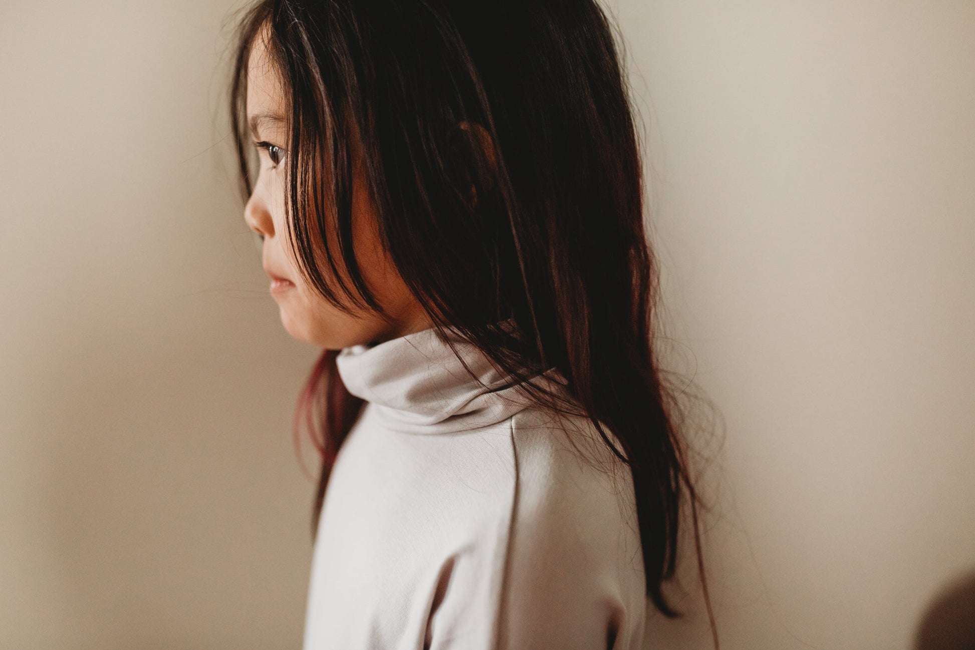 Eco-friendly kids' clothing – gender-neutral Light Grey Taupe grow with me turtleneck, sustainably made in Canada.