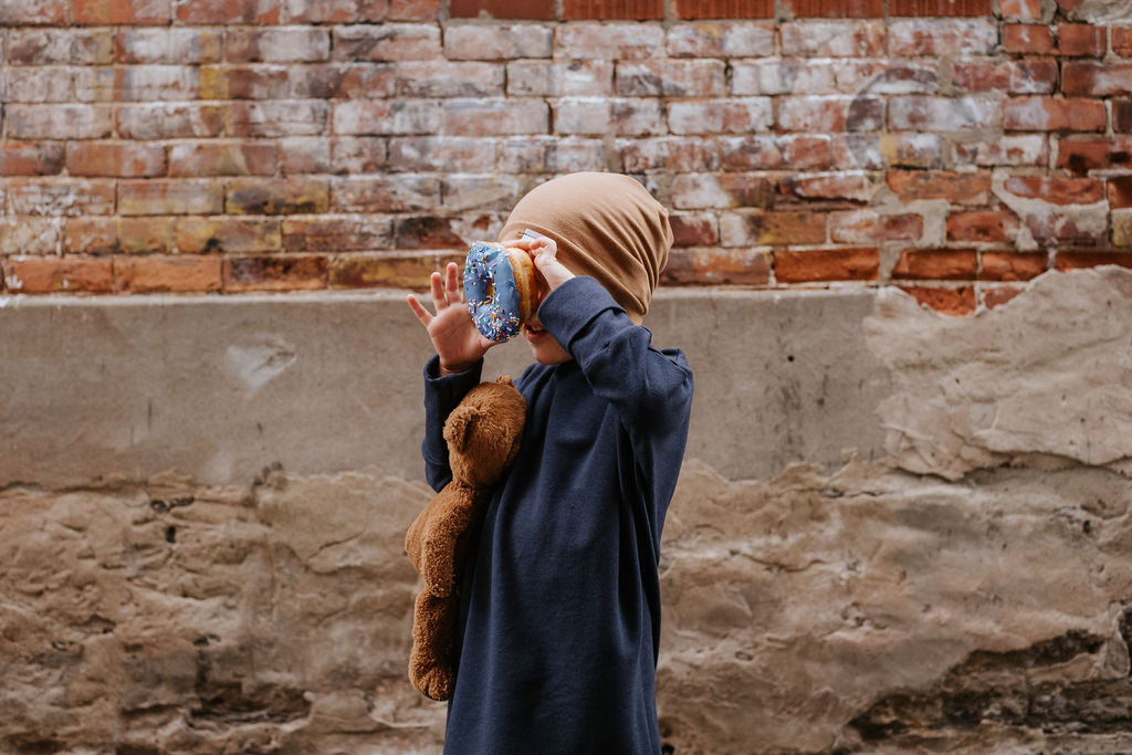 Eco-friendly kids' clothing – gender-neutral Navy grow with me sweater, sustainably made in Canada.