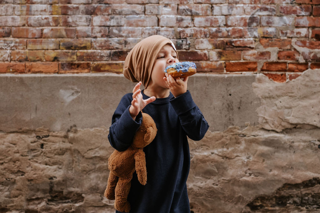 Eco-friendly kids' clothing – gender-neutral Navy grow with me sweater, sustainably made in Canada.