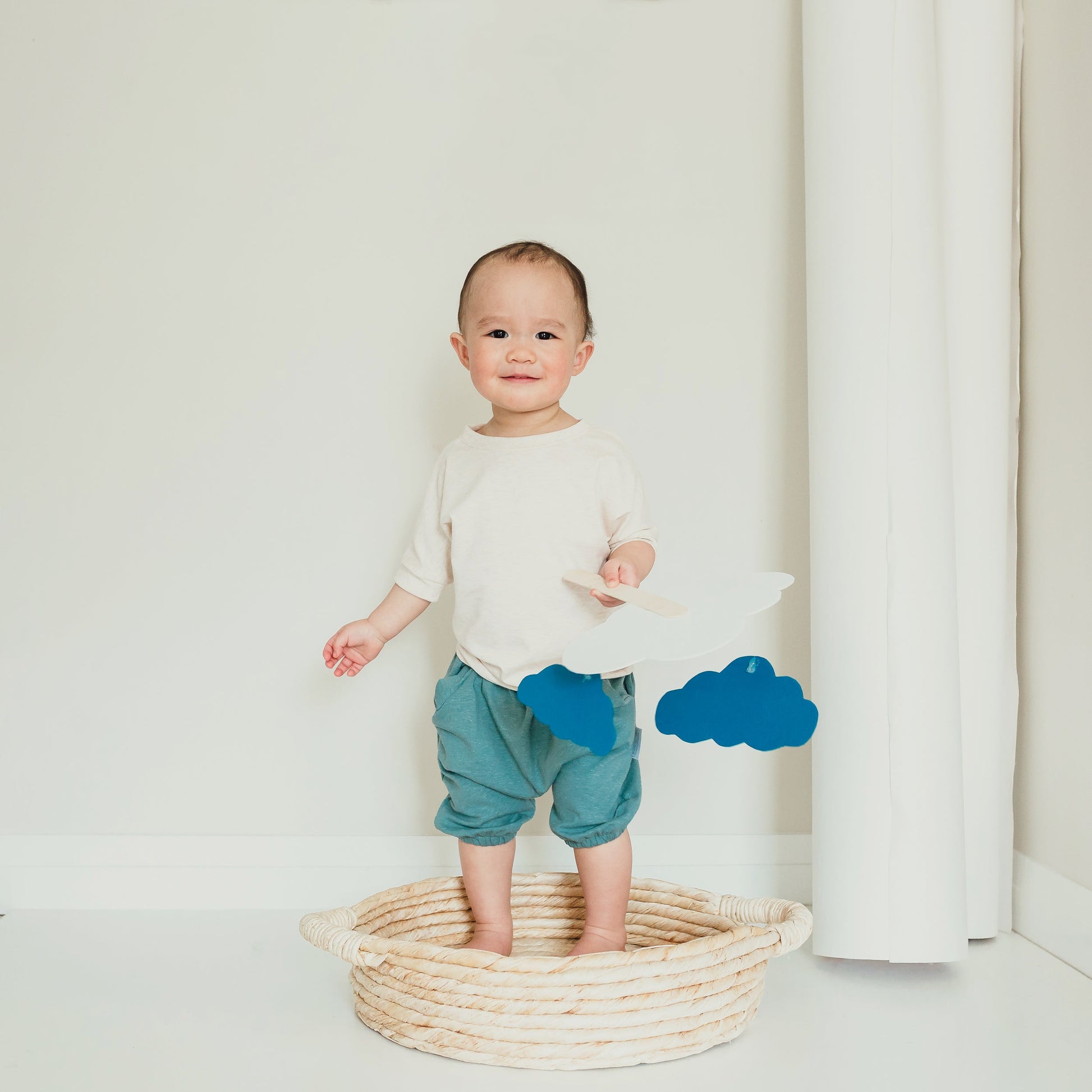 Heather Cream grow-with-me t-shirt for kids, made from soft Lyocell. Ethically made in Canada for a sustainable and comfy fit.