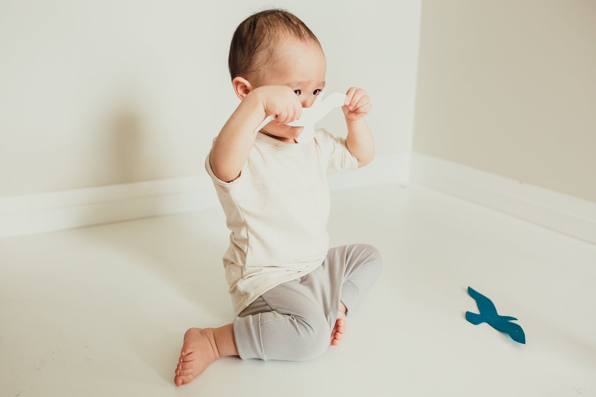 Heather Cream grow-with-me t-shirt for kids, made from soft Lyocell. Ethically made in Canada for a sustainable and comfy fit.