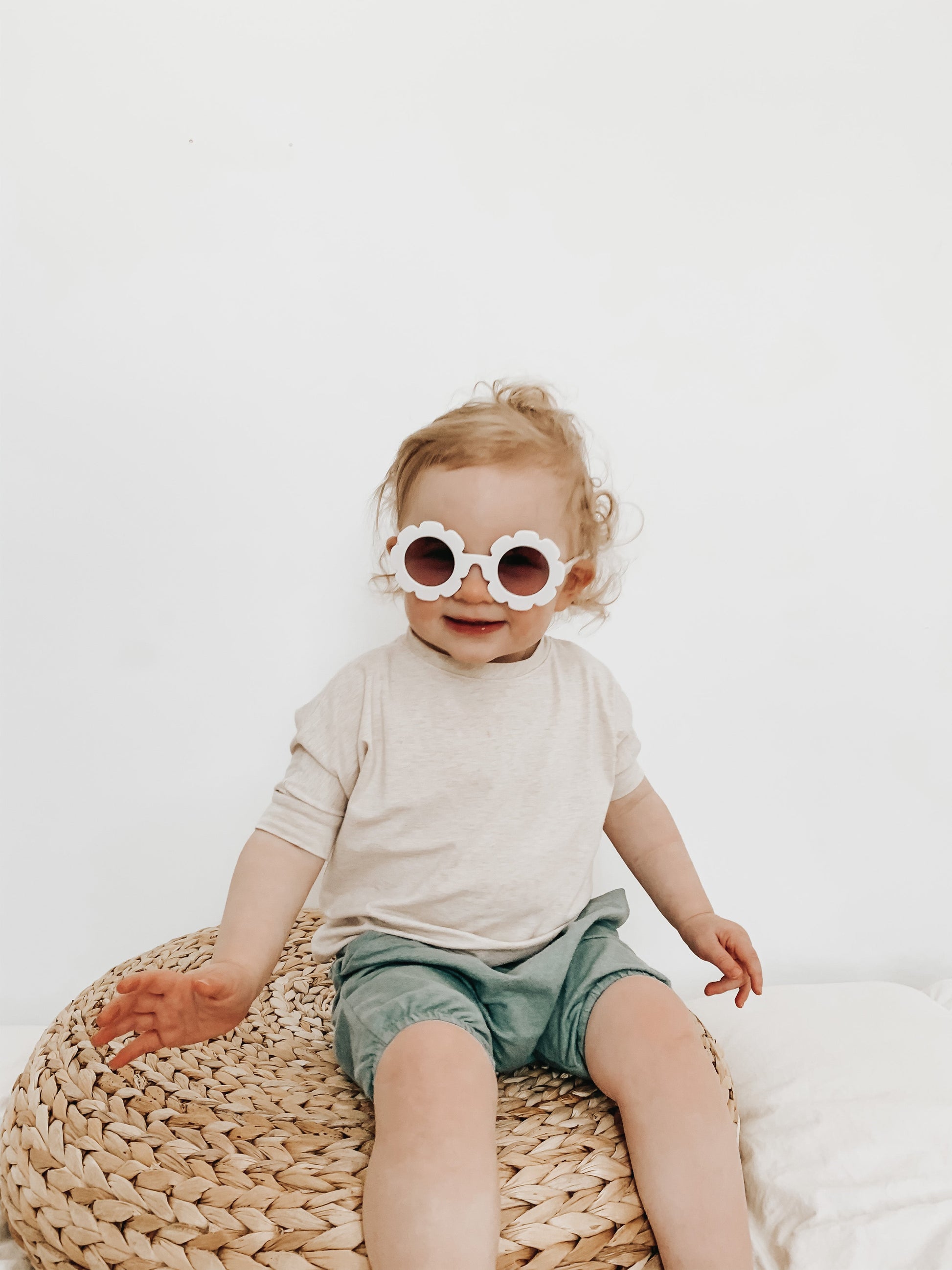 Heather Cream grow-with-me t-shirt for kids, made from soft Lyocell. Ethically made in Canada for a sustainable and comfy fit.