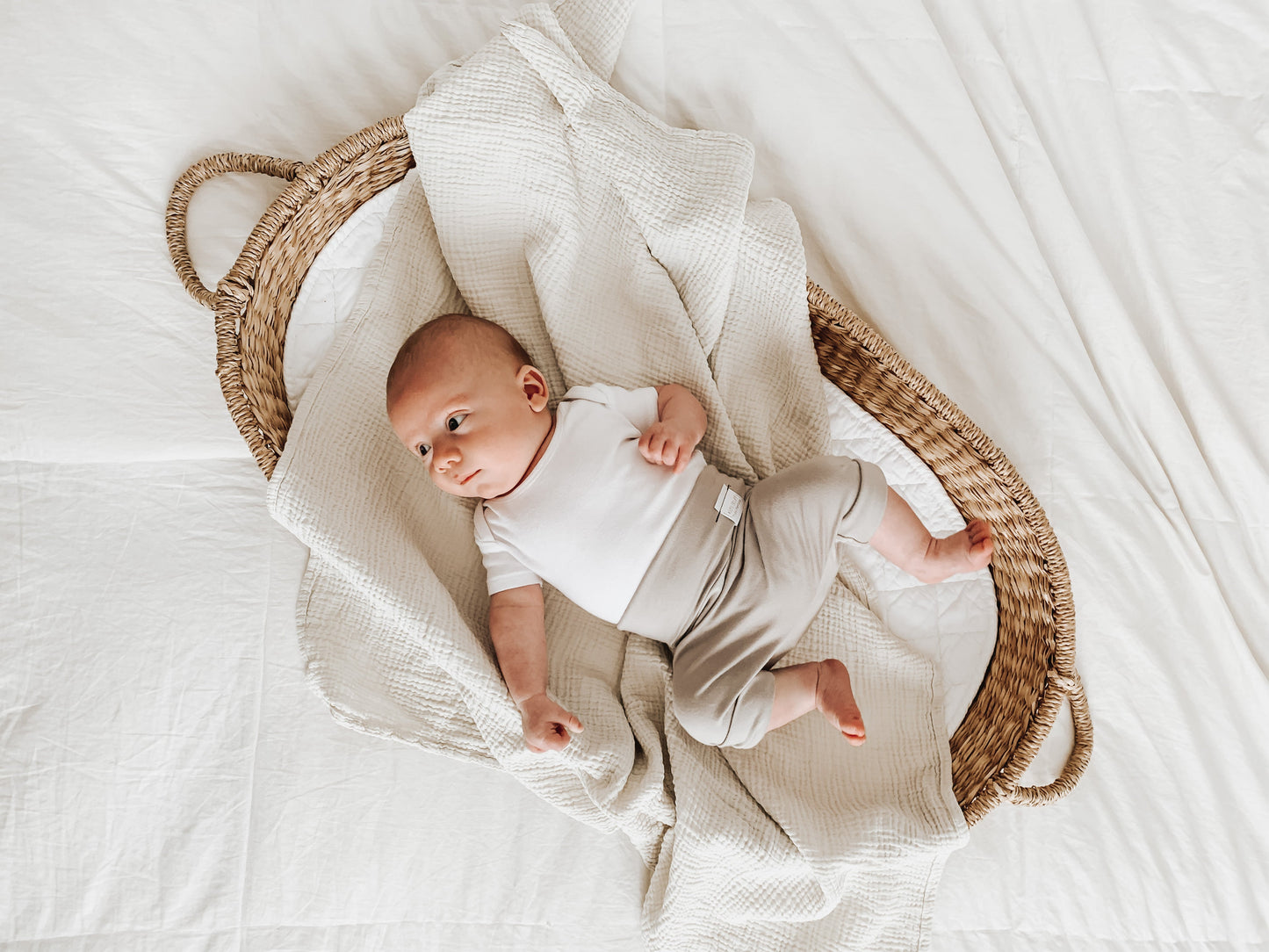 Taupe grow-with-me shorts for kids, made from soft organic cotton with a stretchy, foldable waistband. Ethically made in Canada for a sustainable and comfy fit.