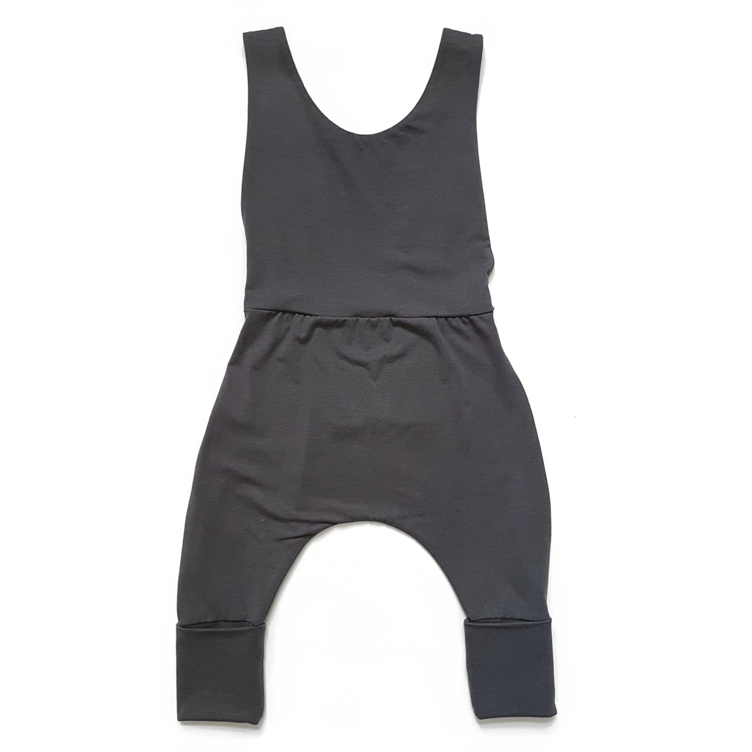 Dark grey grow-with-me overalls for toddlers and kids, made from soft, eco-friendly fabric. Adjustable straps and cuffs for a long-lasting fit. Ethically made in Canada.