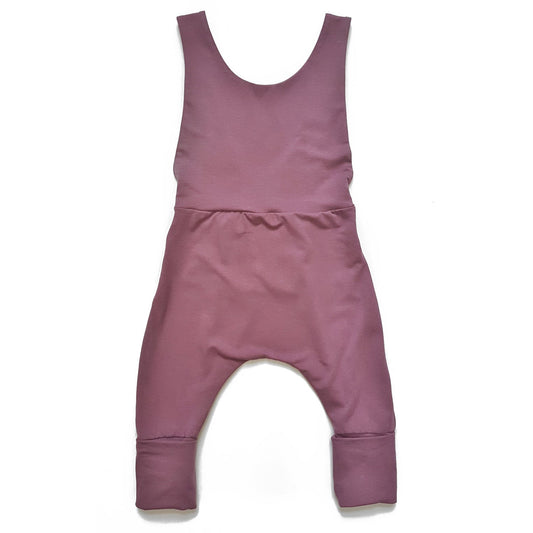 Rose brown grow-with-me overalls for toddlers and kids, made from soft, eco-friendly fabric. Adjustable straps and cuffs for a long-lasting fit. Ethically made in Canada.