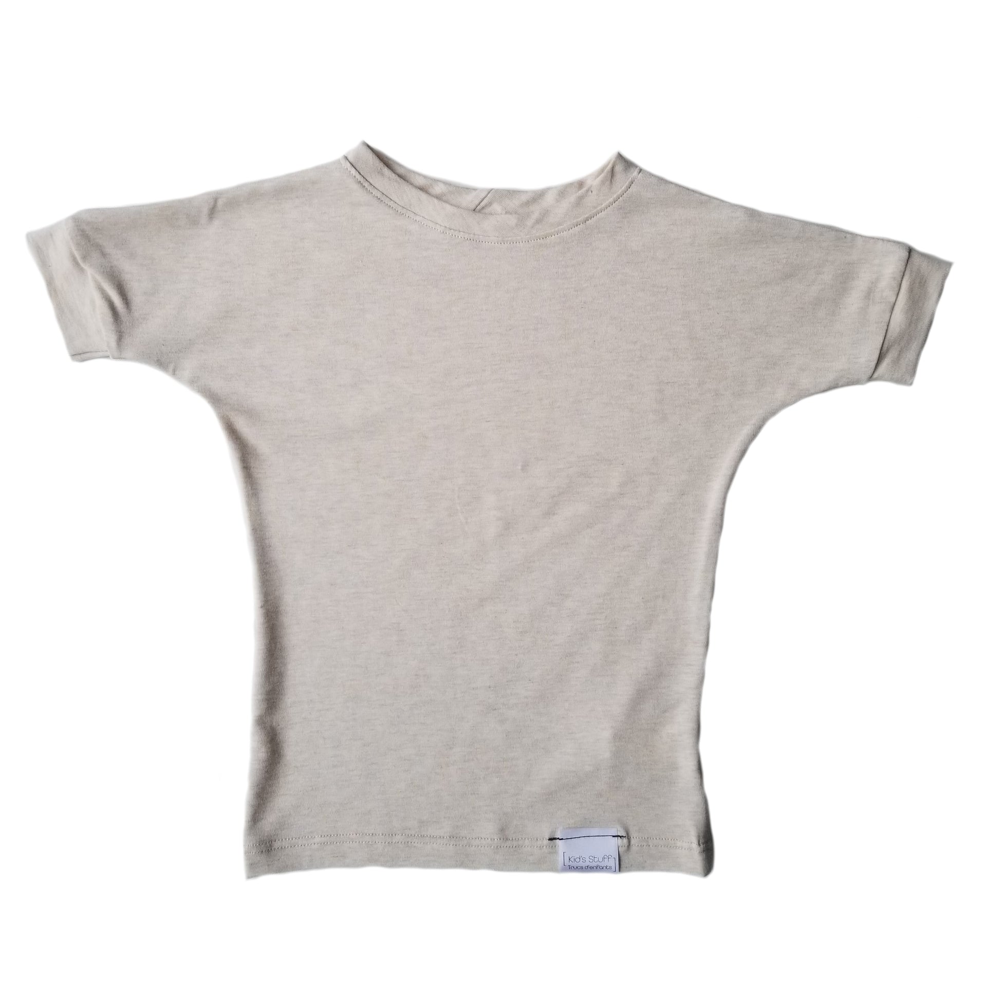 Heather Cream grow-with-me t-shirt for kids, made from soft Lyocell. Ethically made in Canada for a sustainable and comfy fit.