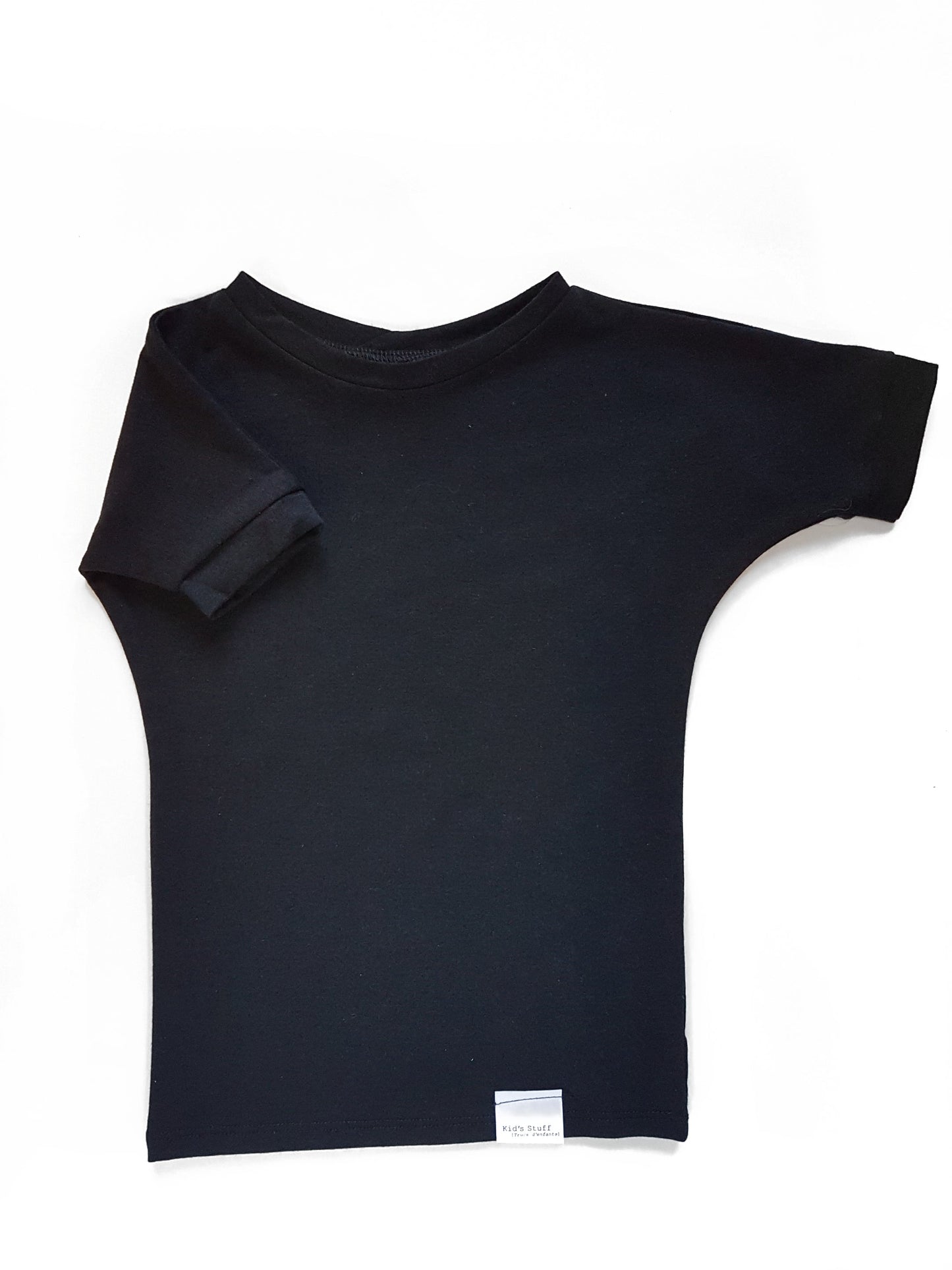 Black grow-with-me t-shirt for kids, made from soft Lyocell. Ethically made in Canada for a sustainable and comfy fit.