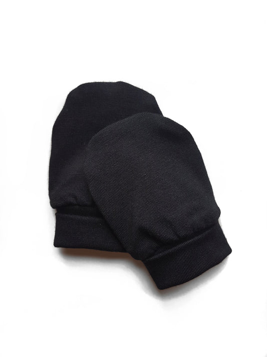 Soft and eco-friendly black newborn mittens, designed to protect delicate skin and prevent scratching. Ethically made in Canada for ultimate comfort and warmth