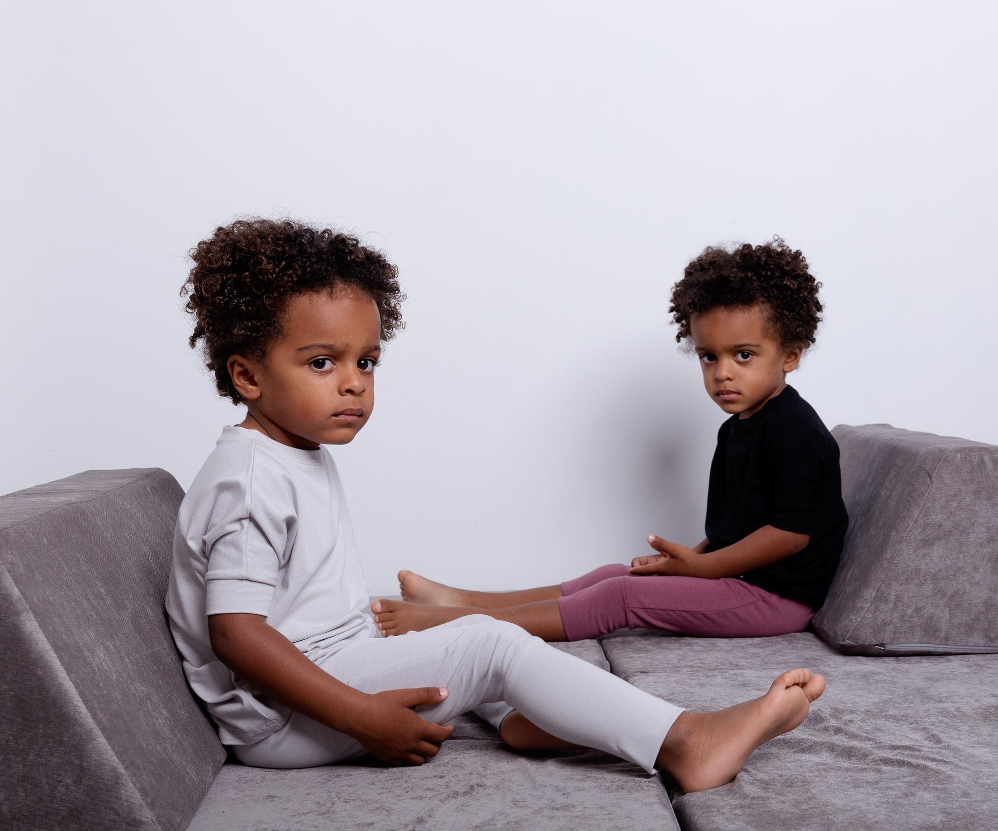 Taupe grow-with-me pants for toddlers and kids, made from soft, eco-friendly fabric. Adjustable waistband and cuffs for extended wear. Ethically made in Canada.