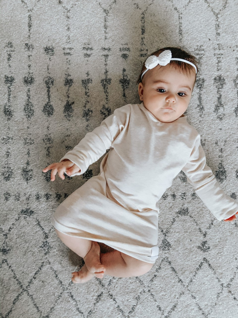 Heather Cream grow-with-me shirt for toddlers and kids, designed to be worn as a dress, tunic, or long shirt. Seamless shoulders and soft, eco-friendly fabric. Ethically made in Canada.