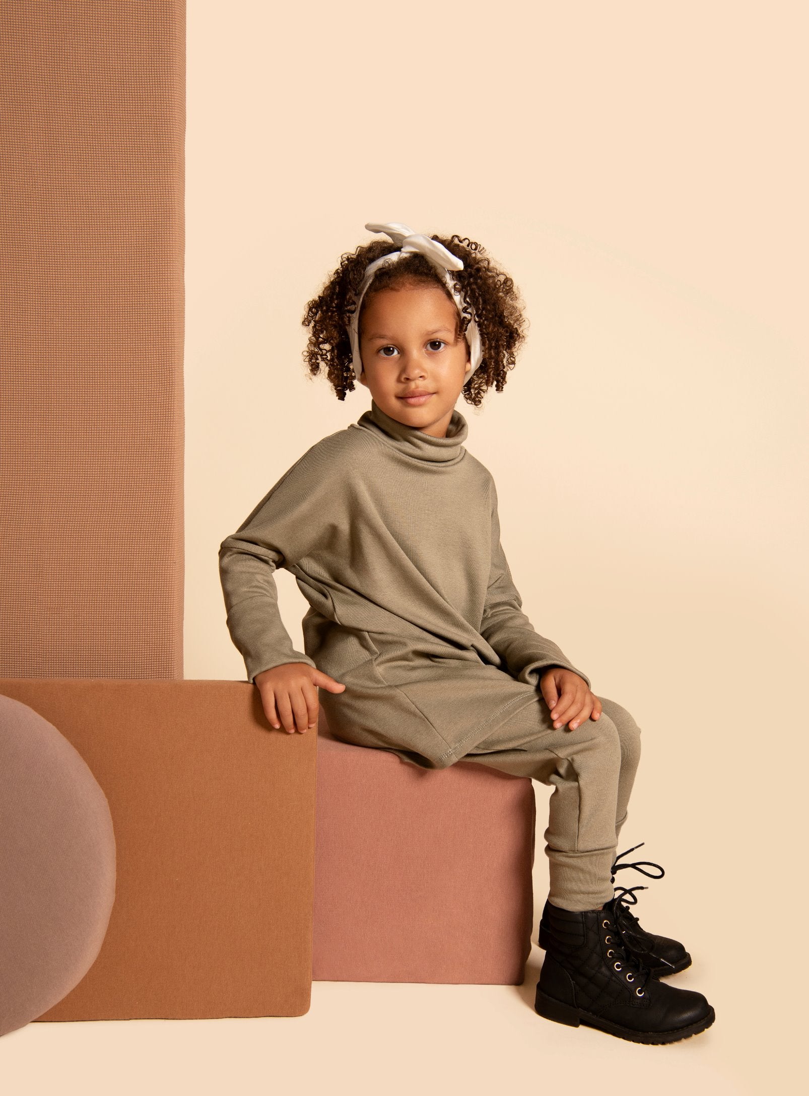 Eco-friendly kids' clothing – gender-neutral grow with me turtleneck, sustainably made in Canada.