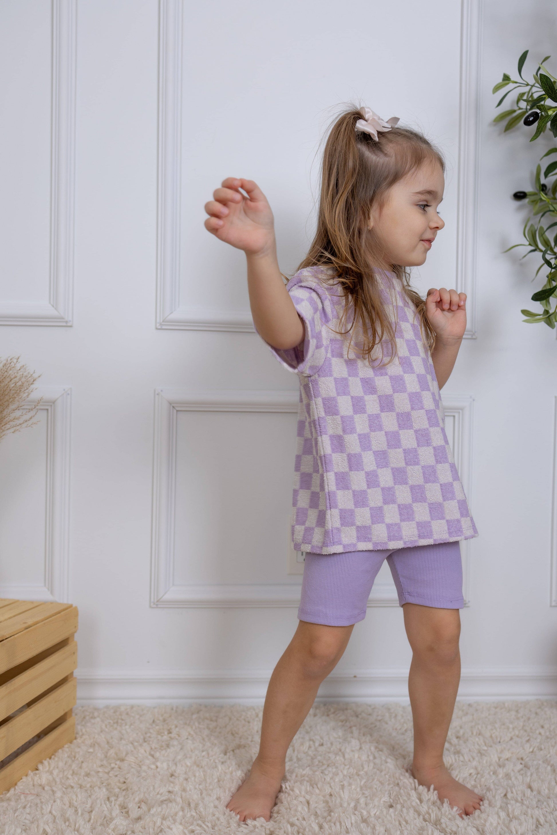 Checkered lilac oversize kids t-shirt made in Canada with eco-friendly fabric designed to grow with your child