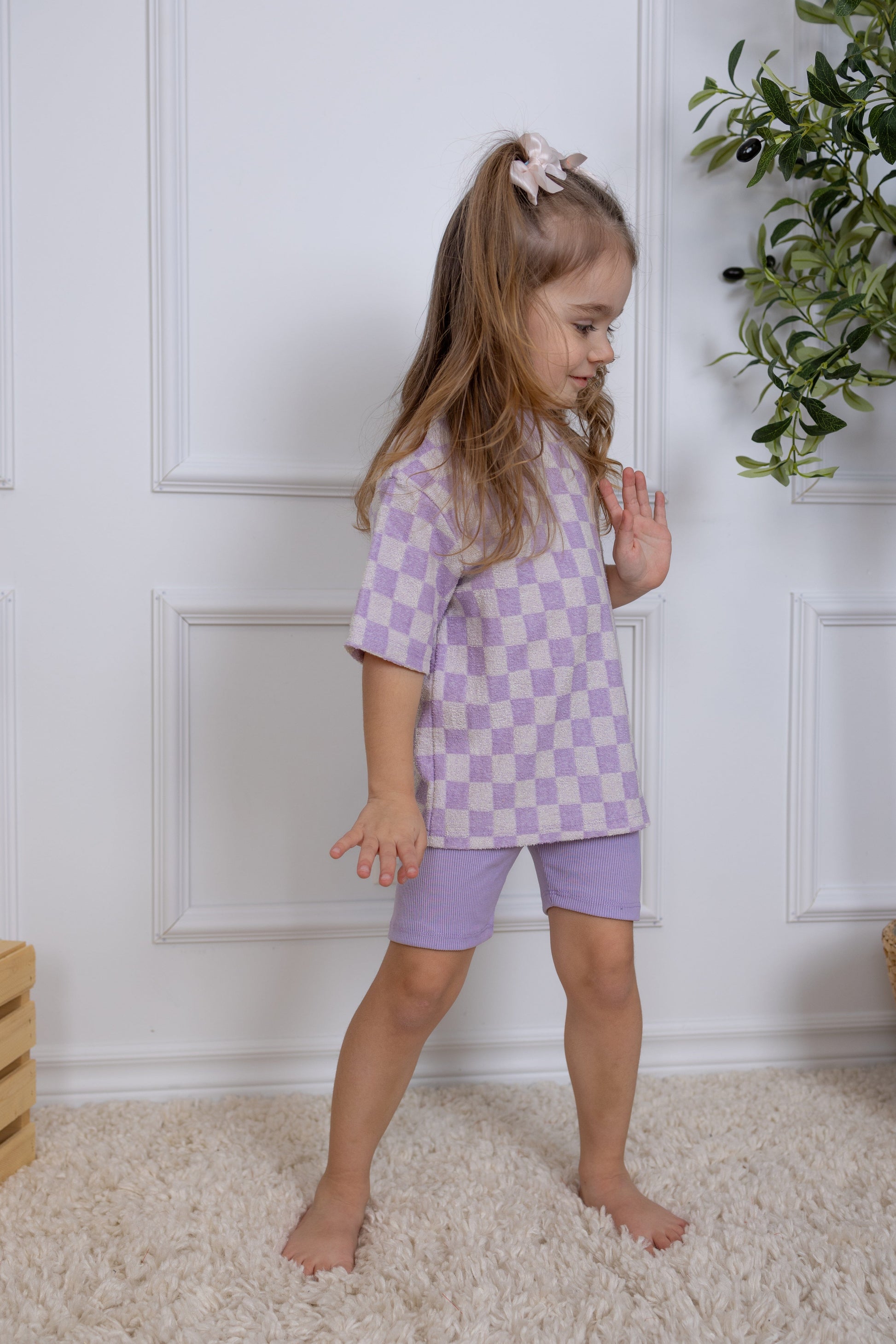 Checkered lilac oversize kids t-shirt made in Canada with eco-friendly fabric designed to grow with your child