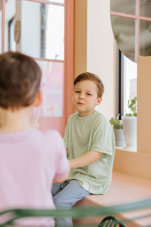 Lime grow-with-me t-shirt for kids, made from soft Lyocell. Ethically made in Canada for a sustainable and comfy fit.