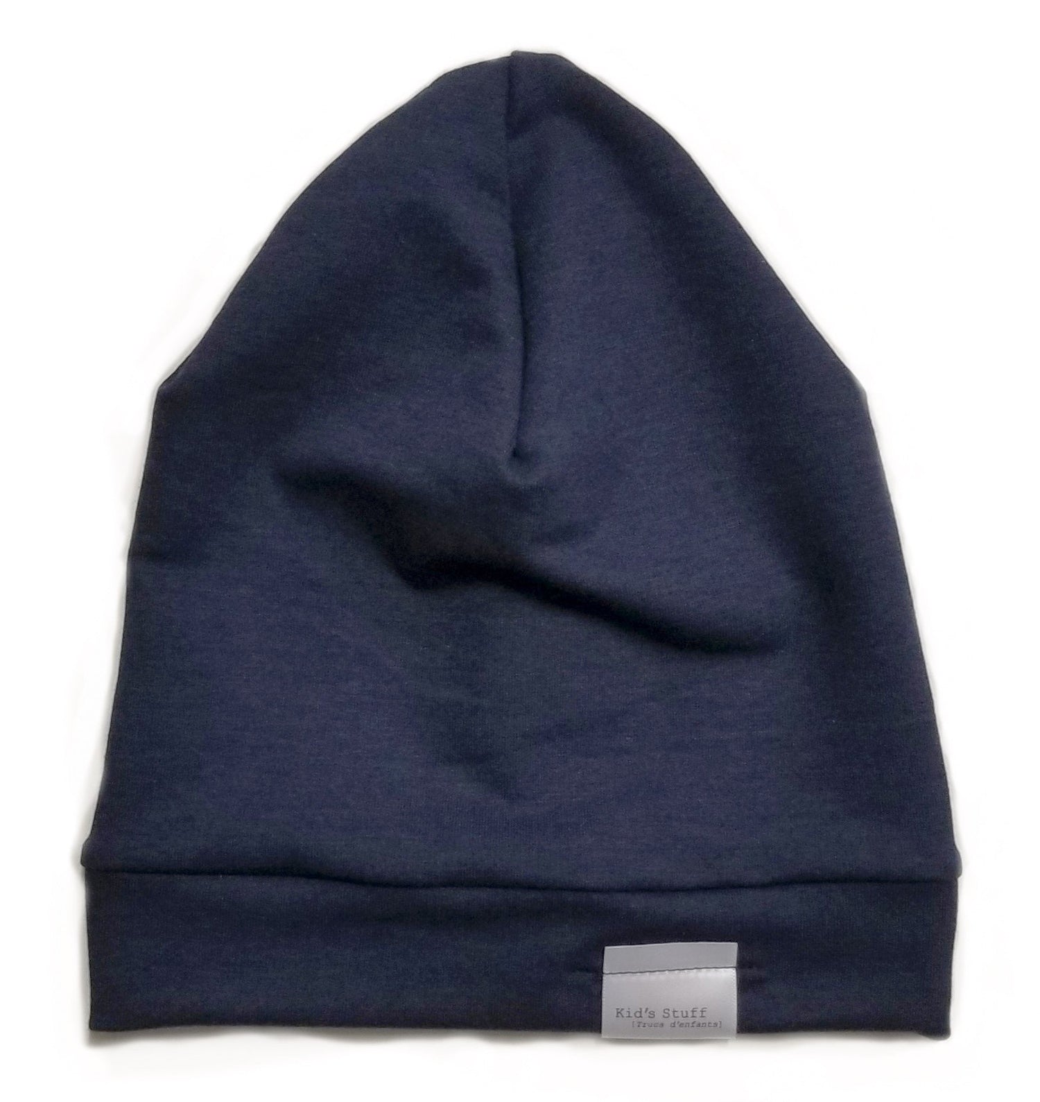 Soft and stretchy navy  beanie for kids, made from eco-friendly fabric. Ethically crafted in Canada, featuring a fold-over brim and minimalist design